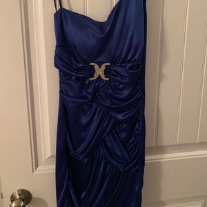 One shoulder blue dress.